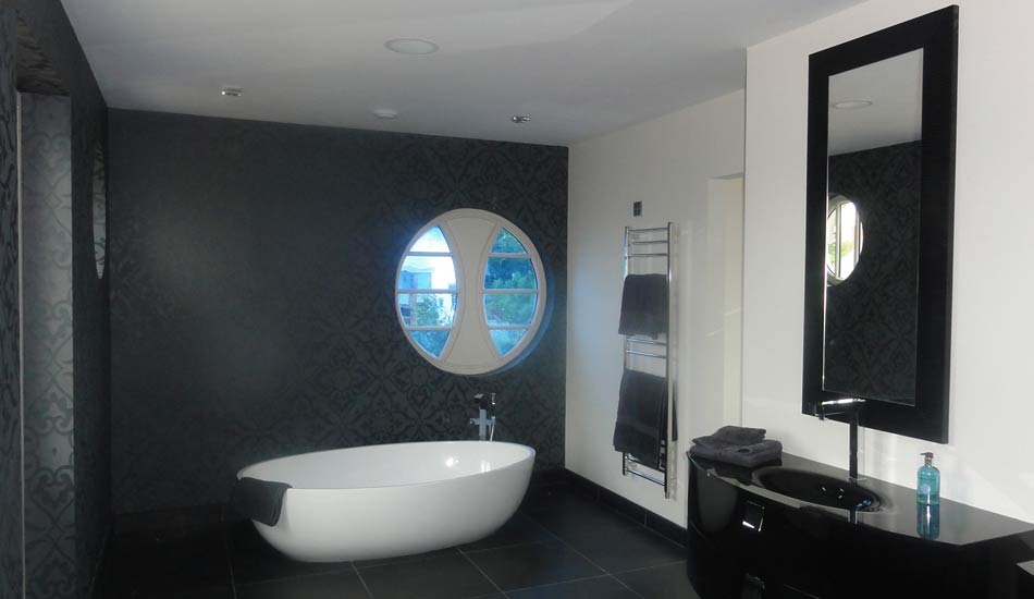 Painting and wallpaper hanging in a luxury bathroom by Total Paintworks Ltd., Decorators, Kerry, Ireland